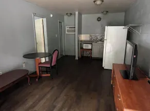 Paradise Suites - Newport News & Jefferson Ave - Living area