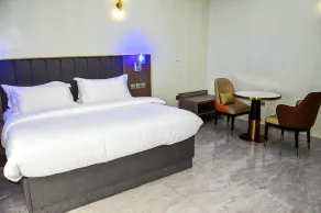 Grand Pallazo Hotel and Suites - Chambre