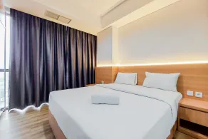 Gorgeous 1BR Apartment at The Smith Alam Sutera By Travelio - Zimmer