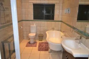 Ikhanda Guesthouse - Badezimmer