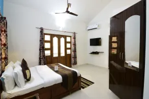 OYO 9741 Triple Beach Guest House - Chambre