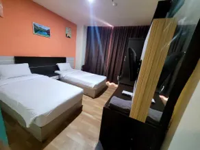 Sans Hotel Lynt Makassar - Habitación