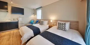Yomitan Condhotel ND - Chambre