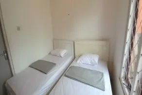 OYO 90974 Homestay Golo Koe Sejahtera - Habitación