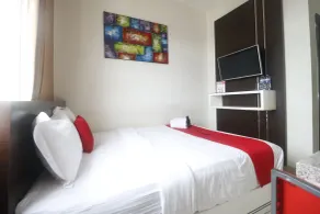 RedDoorz Plus near Universitas Negeri Makassar - Habitación