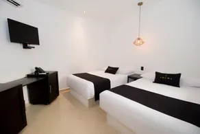 Aruma Suites - Chambre