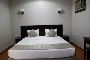 Al Mawasim Al Arbaeah Serviced Apartments - Vue de la chambre