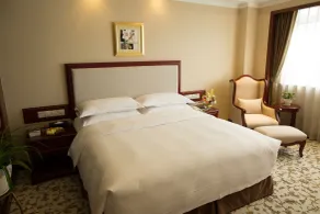 Enrichee Gloria Plaza Hotel Qingdao - Zimmer