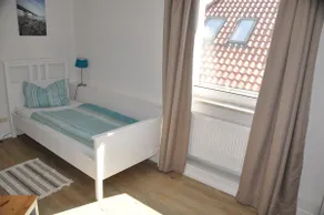 Hotel & Ferienunterkünfte Hus Seeblick - Chambre