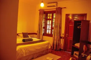 The Charity Hotel International - Room