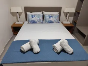 Beachfront Kala's Suites Apartments - Chambre