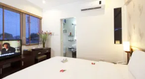 Rising Dragon Legend Hotel - Quarto