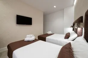 Apartamento Rosales Suites Lujo en el Centro - Værelse
