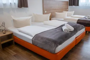 Orange Hotel und Apartments - Chambre