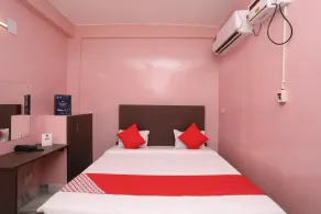 Super Hotel O Chilika Residency - Zimmer