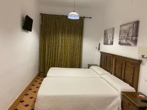 Apartamentos Turísticos - Hostal Los Alisos - Rum