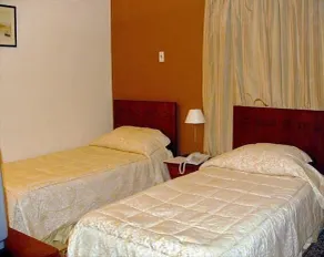 Golden Carven Hotel - Habitación