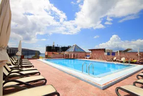 Hotel Reveron Plaza - Piscine sur le toit