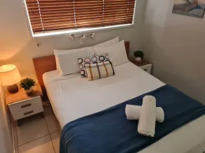 Cranbourne Court Beachside Apartments - Habitación