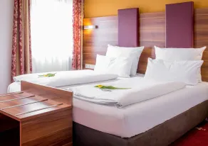 TIPTOP Hotel Burgschmiet Garni - Chambre