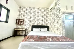 Capital O 93829 Alika Homestay Syariah - Room