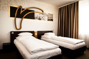 H+ Hotel Ried - Room