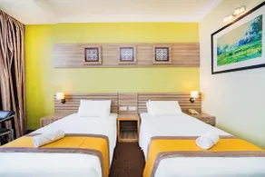 HIG Hotel & Convention - Chambre
