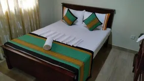 Sunshine Tourist Rest - Zimmer