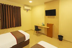 Super OYO Townhouse OAK Hotel Fiducia Serpong - Værelse