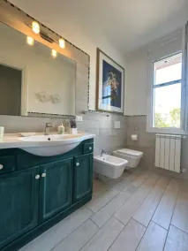 Retiro en un jardín junto al mar en Albarella - Baño