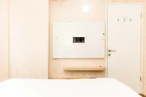 Comfort Living 1BR at Grand Sentraland Karawang Apartment By Travelio - Room