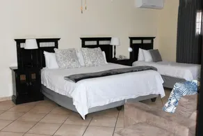 Batter Boys Guest House - Zimmer