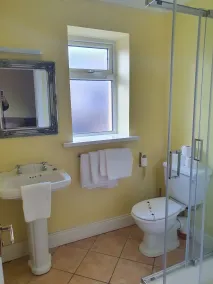 GoldenDawn Guest House - Baño