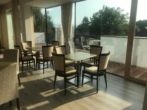 Deluxe TIVOLI Suites - Restaurant