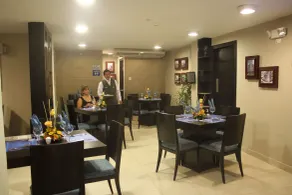 Hotel MC Suites - Confort cerca del Aeropuerto - Restaurant