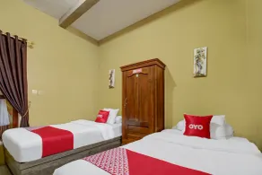 Reddoorz Syariah at House Of Melati Kepanjen - Habitación