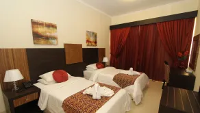 Ivory Grand Hotel Apartments - Chambre