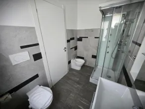 7 LAKES Aparthotel - Badezimmer