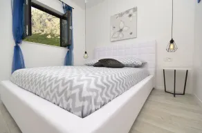 Moderne Villa Nina mit beheiztem Pool und herrlichem Meerblick - Zimmer