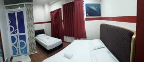 Warisan Family Inn - Værelse