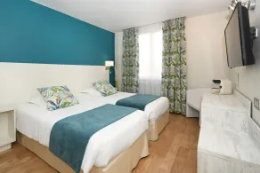 Logis Hôtel du Centre - Halte idéale en cyclotourisme avec garage à vélos clos - Værelse