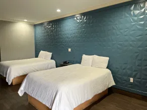 The Symphony Inn & Suites - Chambre