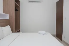 Modern 1BR at Ciputra World 2 Apartment By Travelio - Zimmer