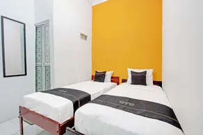 Capital O 92929 Hotel New Tirta Kencana Syariah - Room