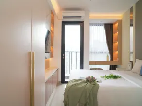 Comfort and Warm Studio at Ciputra World 2 Apartment By Travelio - Room