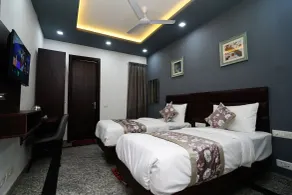 Posh Garden Inn - Quarto