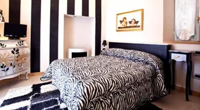 Lori's Inn - Habitación