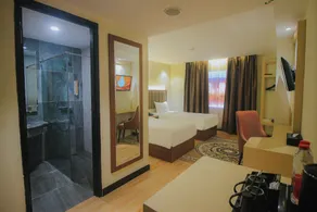 Qin Hotel Banjarbaru - Salle de bain