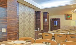 Treebo Elite City Upper Bazar - Restaurante