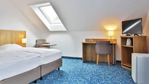 Appartis - Hotel am Stadtpark - Chambre